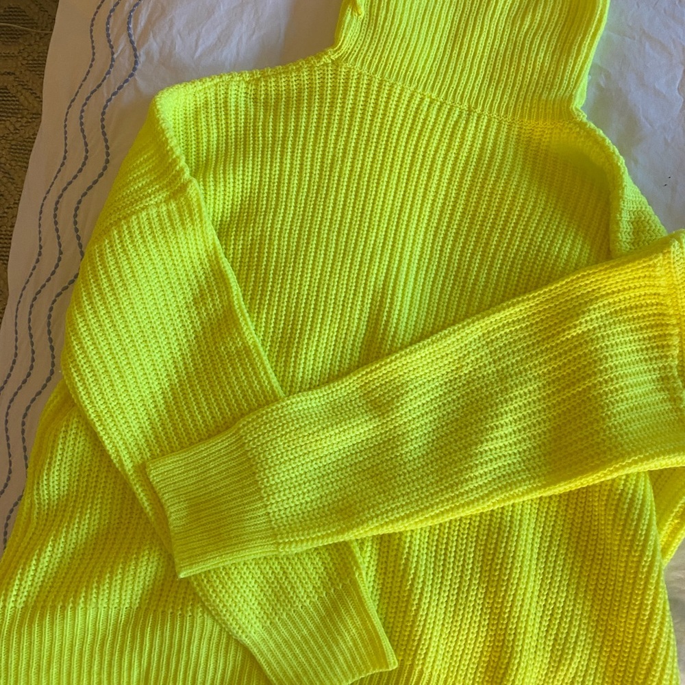 Yellow turtleneck sweater